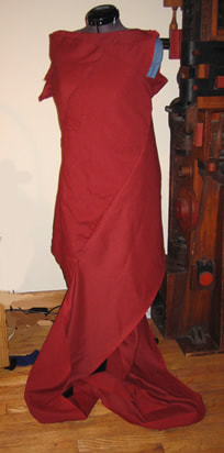 photo of fabric draped on a dress form