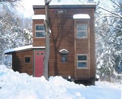 photo of our studio building after a snow storm
